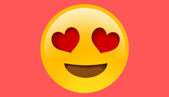что означает смайлик с сердечками в глазах