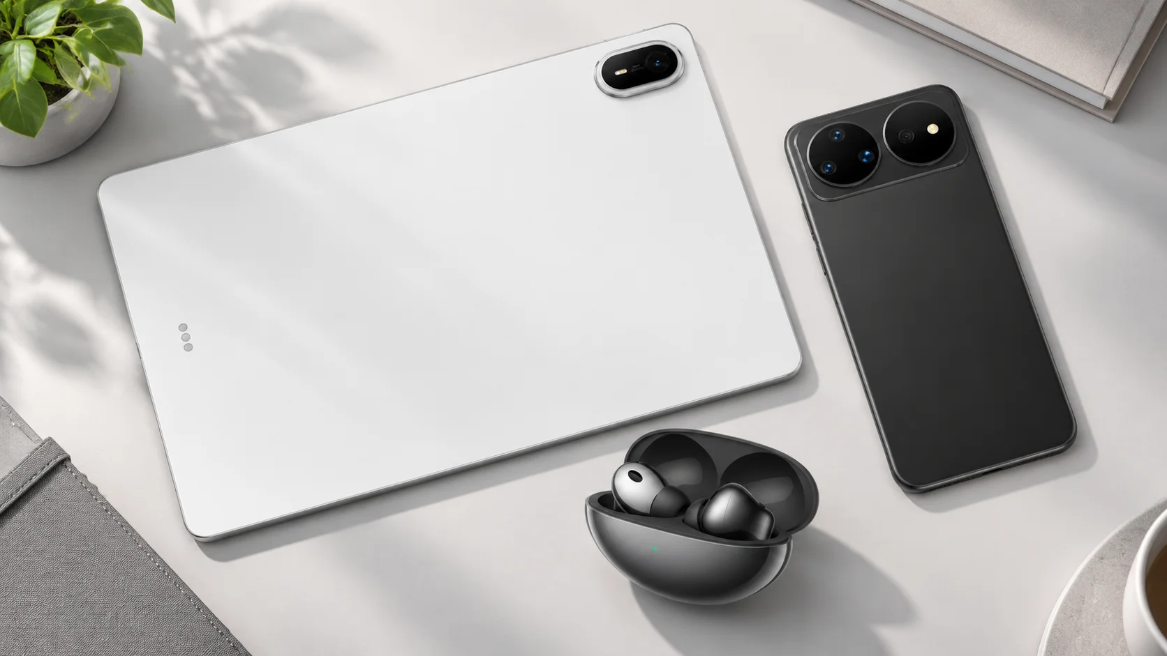 Смартфоны и планшет Huawei на столе.